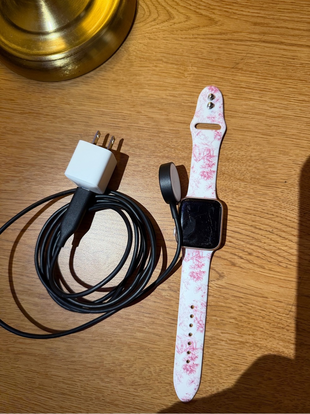 Apple Watch with White and Pink Floral Silicone Band and Charger